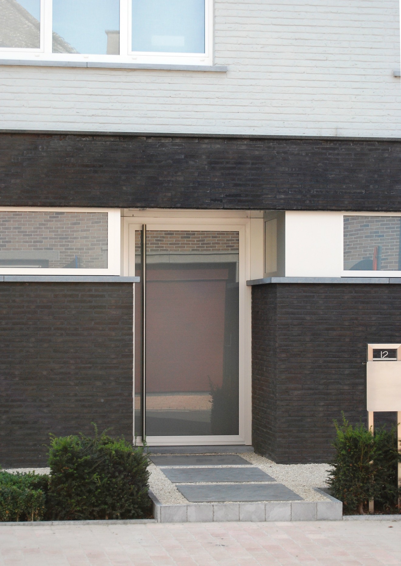Architect- en ingenieursbureau Andries & Vuylsteke - Verbouwing winkelpand naar gezinswoning 